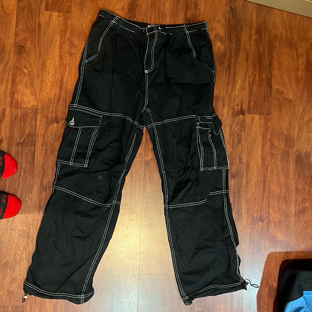 size medium garage high rise cargo straight leg black pants with white detailing